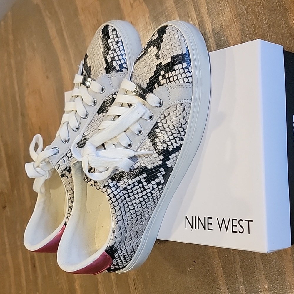 9.5 nine west  taupe multi snake  print sneaker w pink back.  worn once.